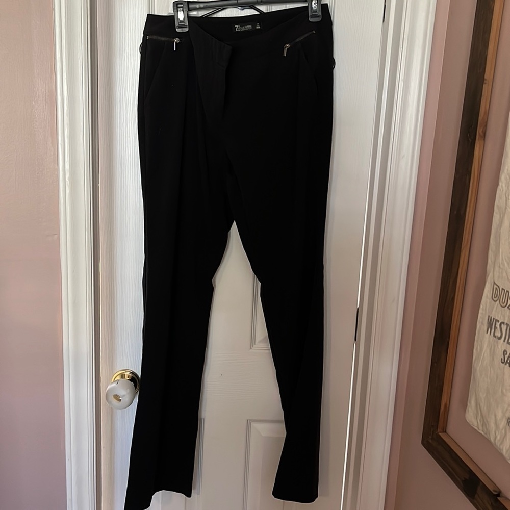 Black trousers with zipper detail. Size 10 long